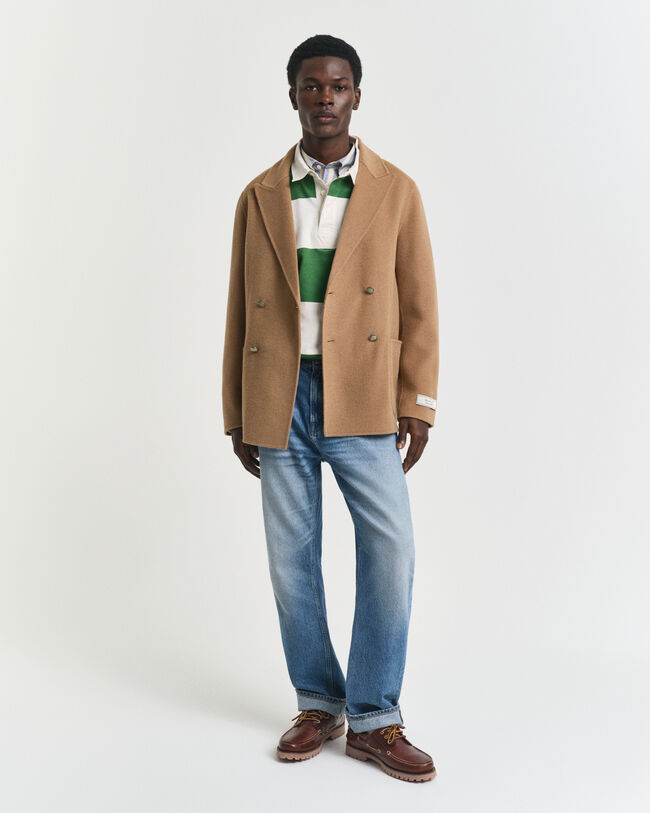 Käsin tikattu klubitakki