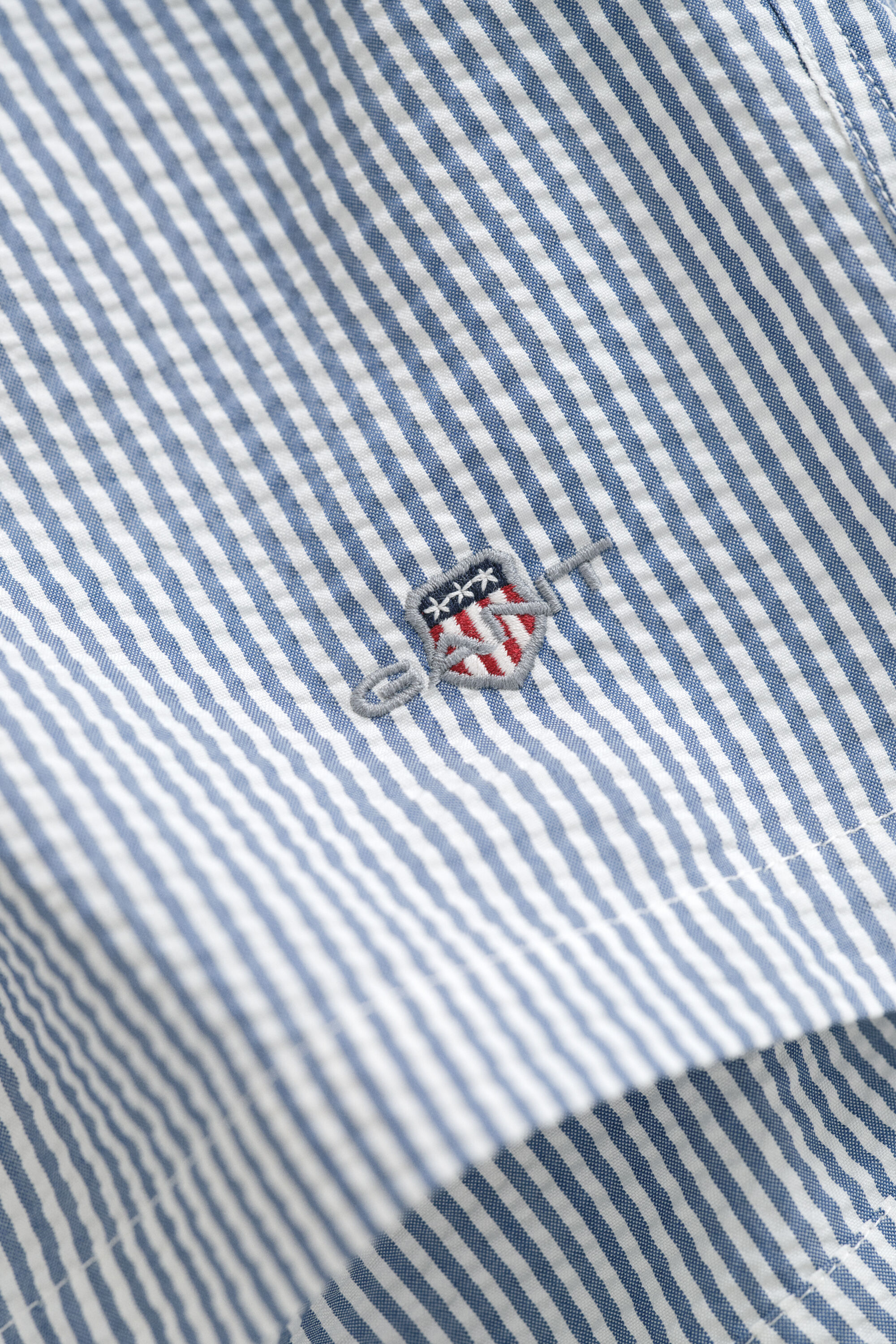 Raidalliset seersucker-uimashortsit