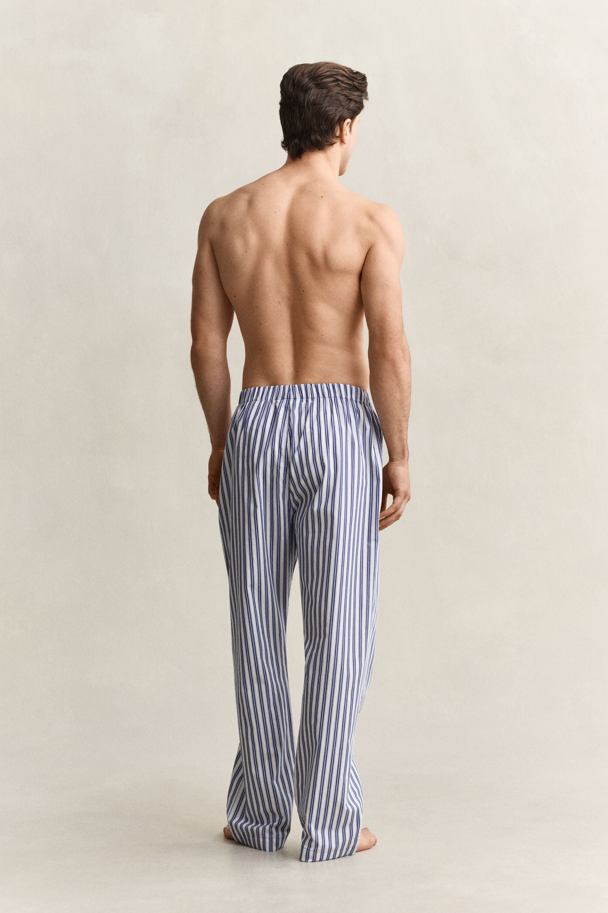Raidalliset pyjamahousut