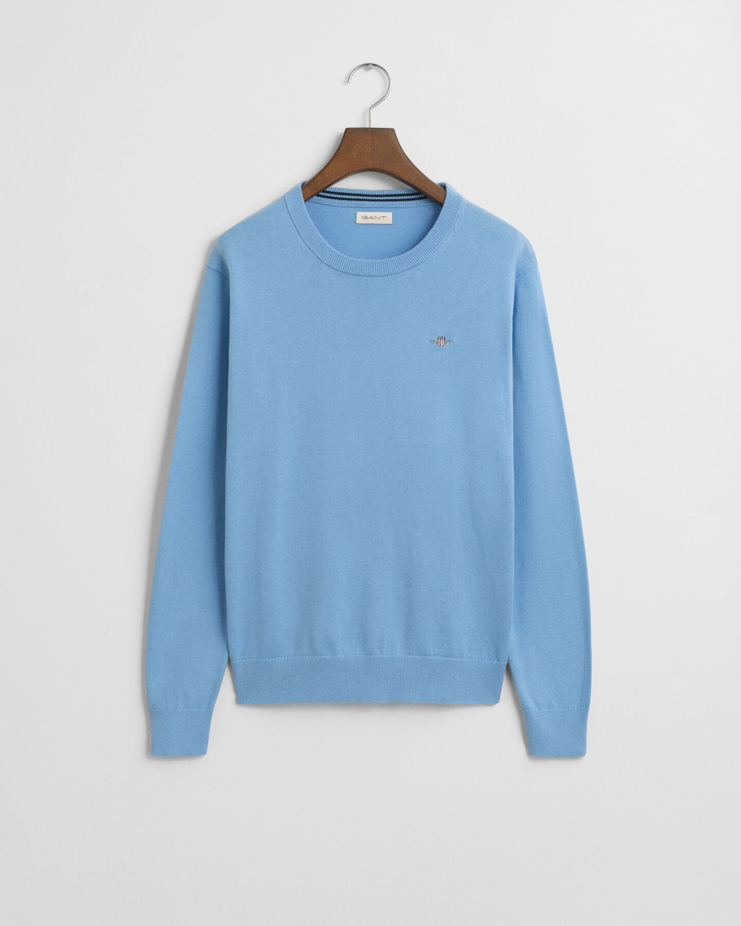 Teens-malliston Shield Classic -puuvillaneulepusero, jossa pyöreä pääntie