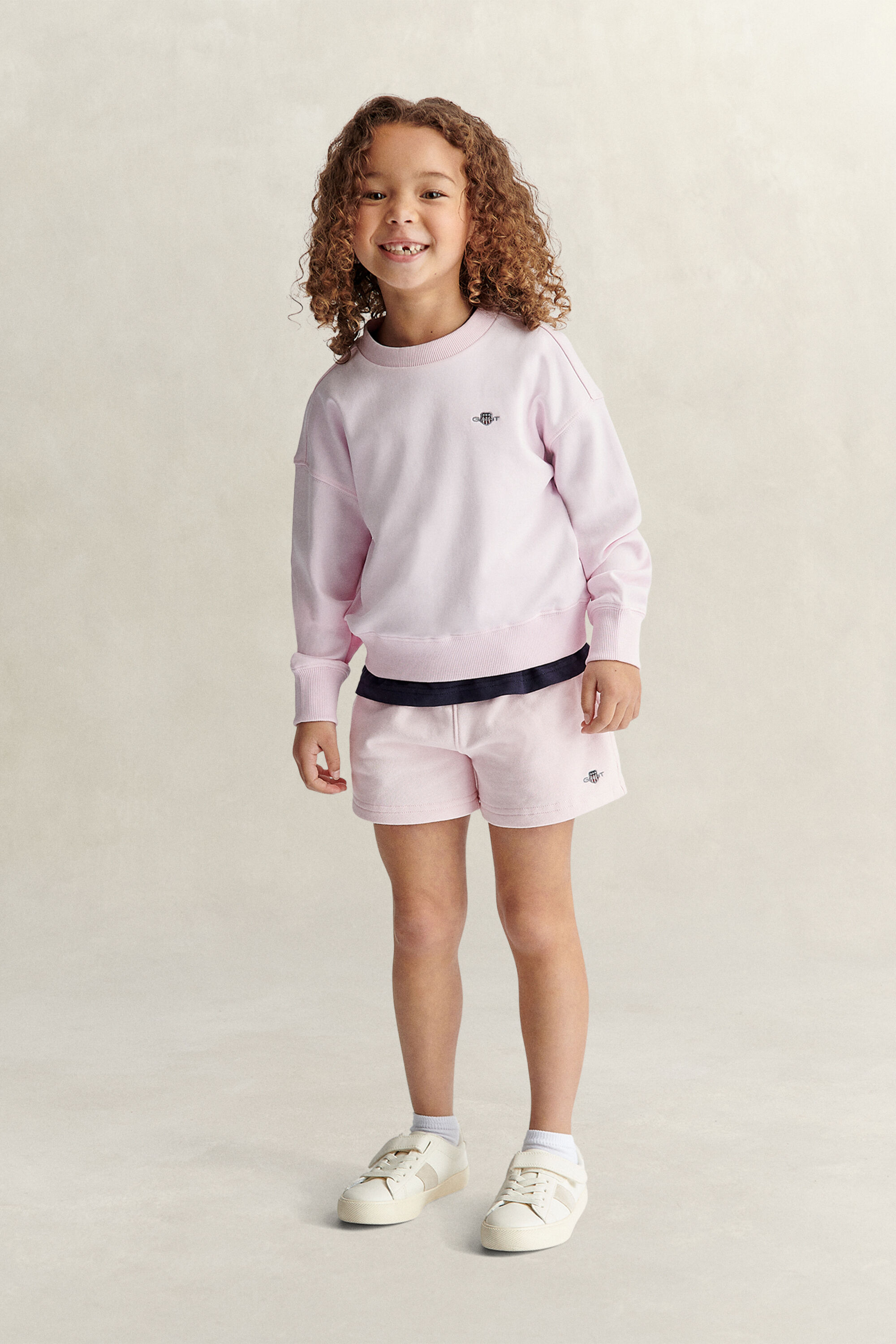 Girls-malliston oversized fit ‑mitoitettu Shield-collegepaita