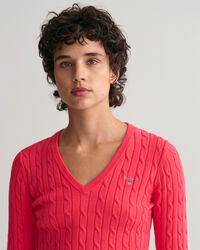 Joustava puuvillapalmikkoneule, jossa v‑pääntie