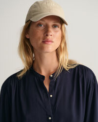 Relaxed fit ‑mitoitettu pusero leveillä kalvosimilla