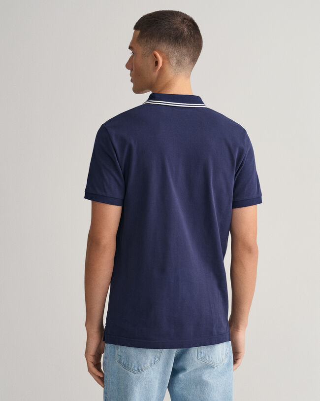 Pikeepaita, jossa raidallinen kaulus