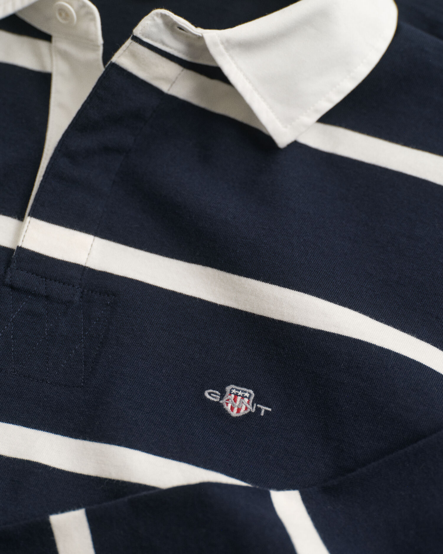 Teens-malliston raidallinen Shield Rugger ‑paita