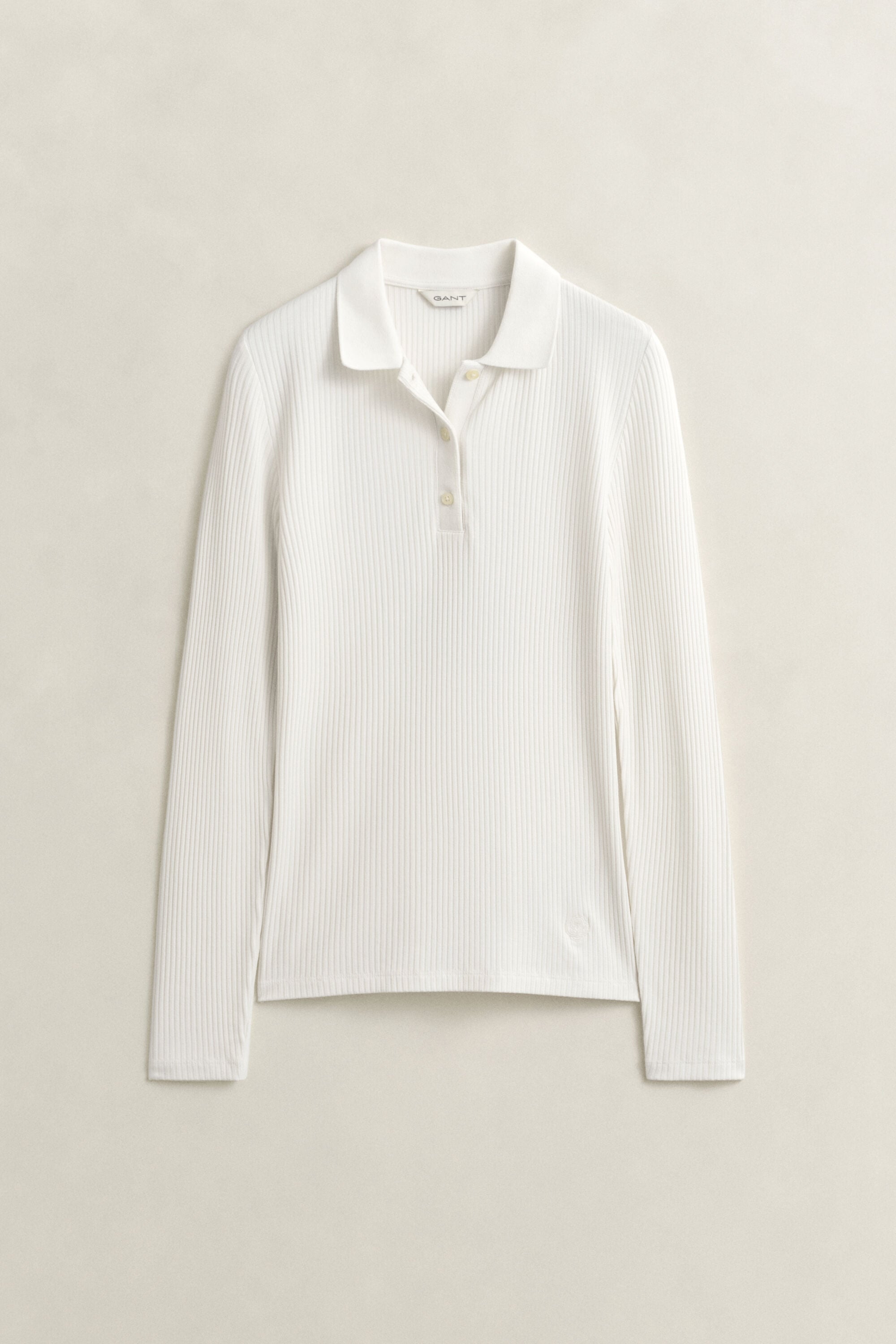 Slim fit -mitoitettu joustinneulottu pikeepaita