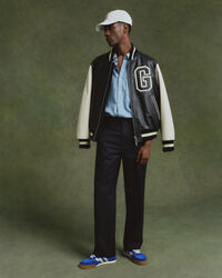 Relaxed fit ‑mitoitetut liituraidalliset puvunhousut