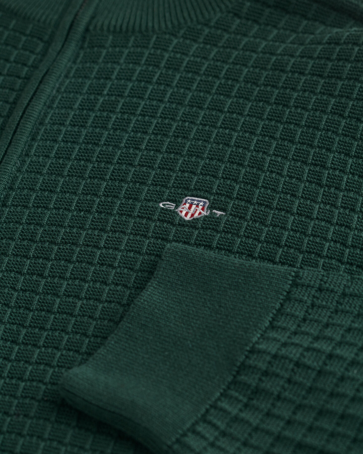 Kohopintainen vetoketjullinen puuvillaneuletakki