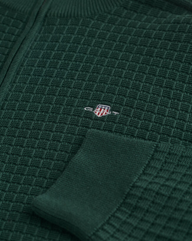 Kohopintainen vetoketjullinen puuvillaneuletakki