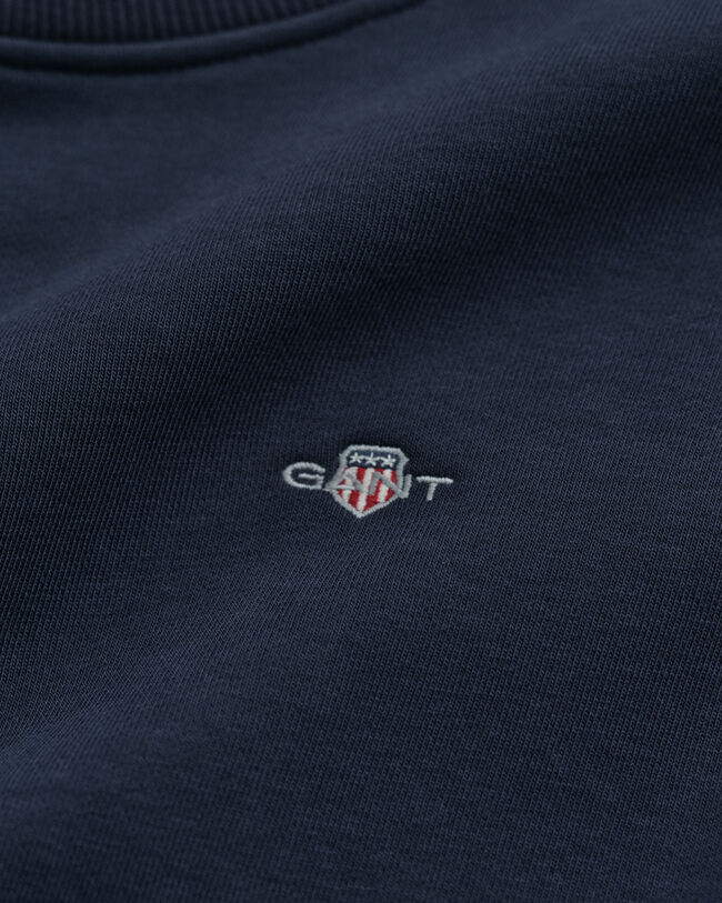 Shield-collegemekko, pyöreä pääntie