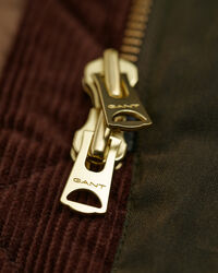 Vahapintainen puolipitkä takki