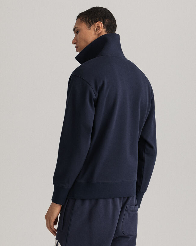 Retro Flag ‑neulepusero puolivetoketjulla