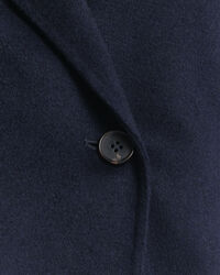 Käsin tikattu takki ja vyö