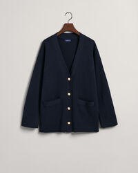 Relaxed fit ‑mitoitettu neuletakki, jossa v-pääntie