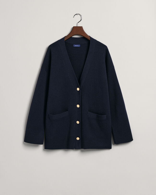 Relaxed fit ‑mitoitettu neuletakki, jossa v-pääntie