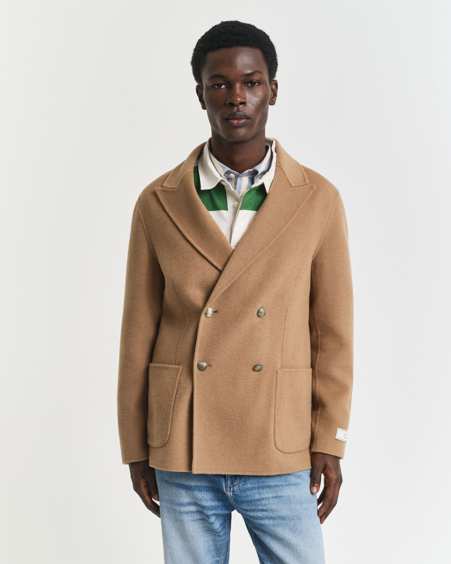 Käsin tikattu klubitakki