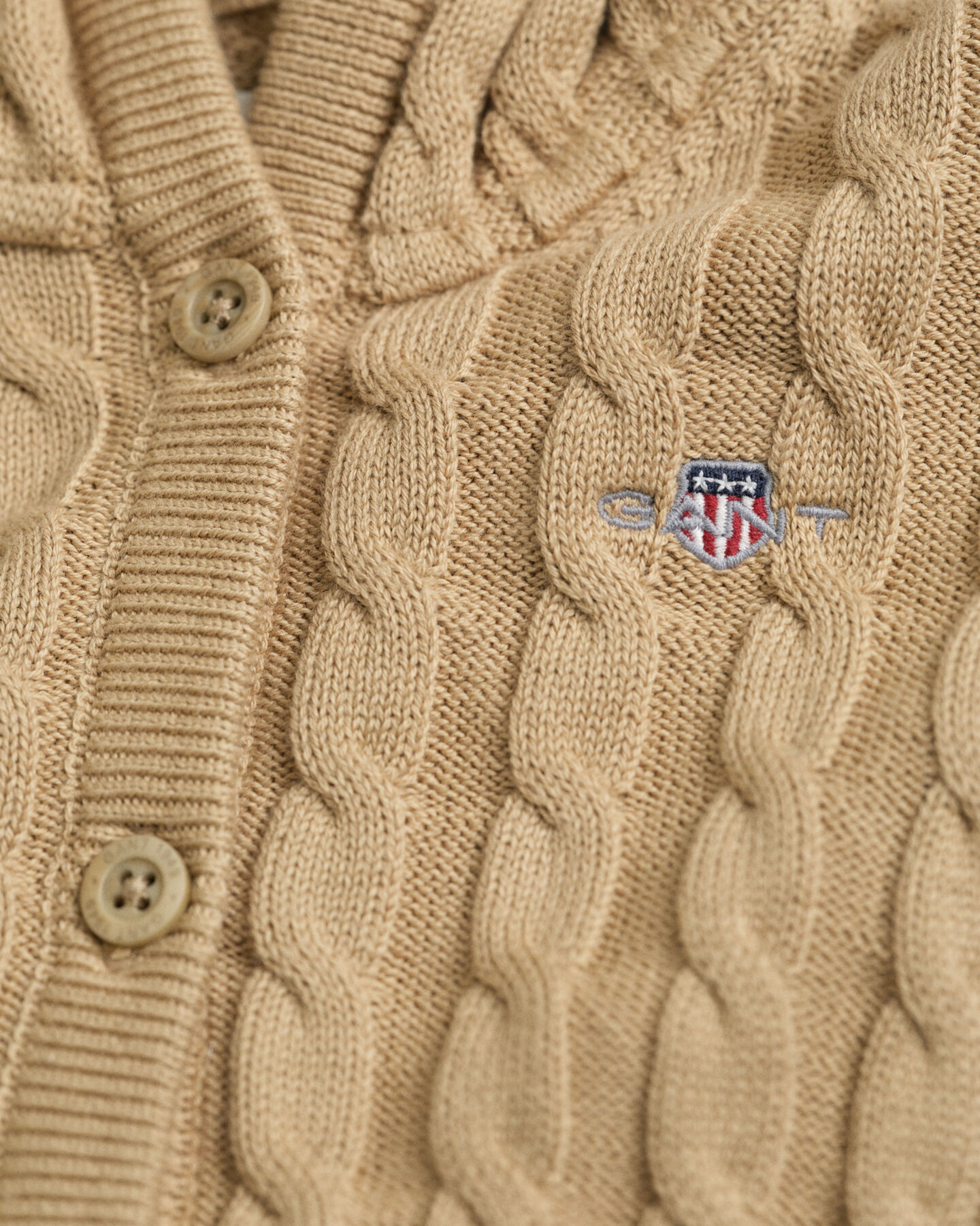 Baby-malliston puuvillainen palmikkoneuletakki