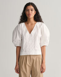 Puhvihihainen pusero, jossa v-pääntie