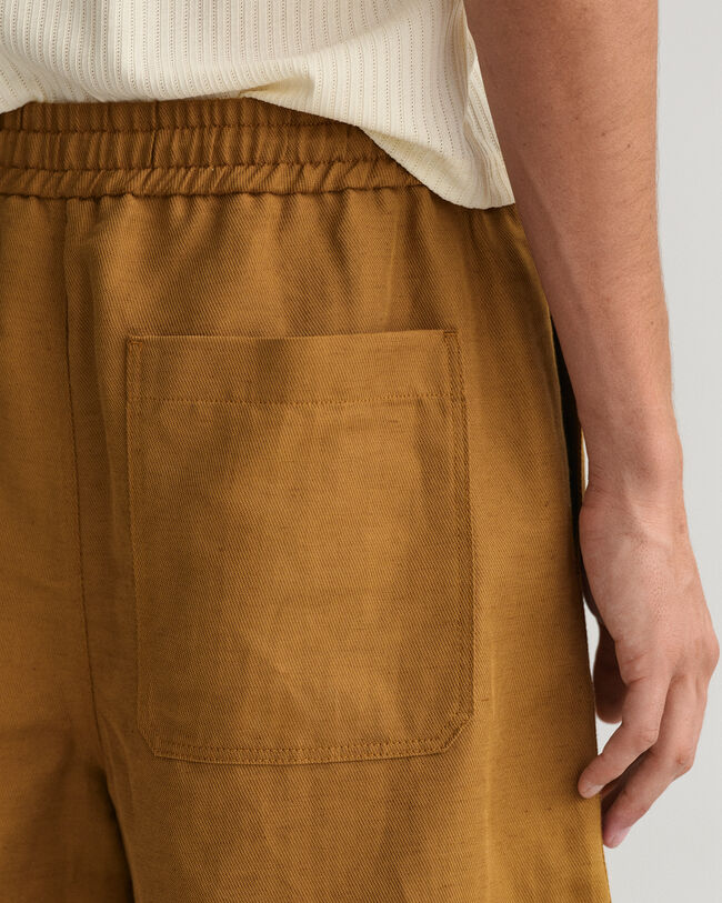 Puuvillapellavasta valmistetut kiristysny&ouml;rilliset shortsit