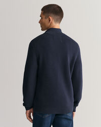 Kohopintainen puuvillaneulepusero, jossa vetoketjullinen p&auml;&auml;ntie