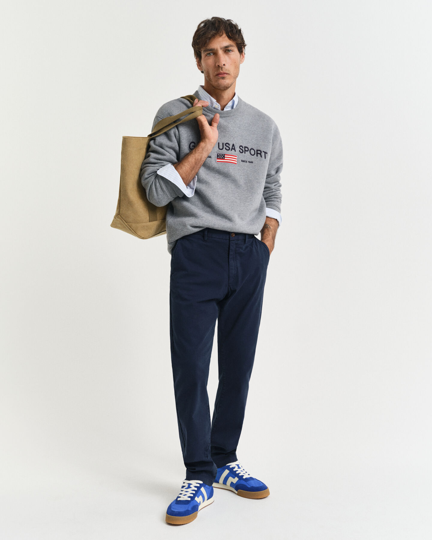 Slim fit ‑mitoitetut dobby-kudotut chinot