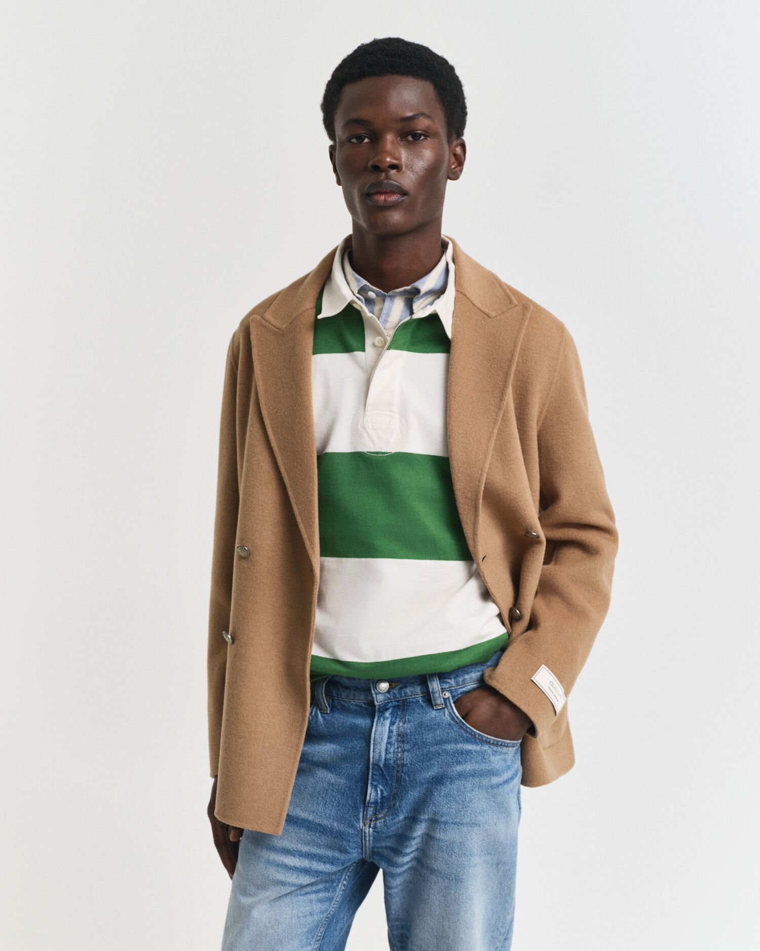 Käsin tikattu klubitakki