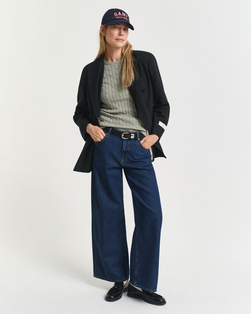 Joustopuuvillainen palmikkoneulepusero, jossa pyöreä pääntie