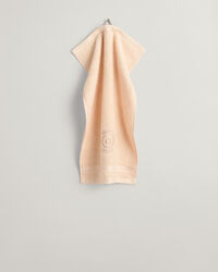 Crest‑pyyhe (30 cm x 50 cm)