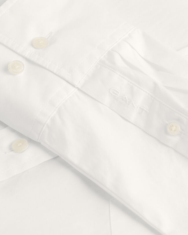 Relaxed fit ‑mitoitettu vajaamittainen paita