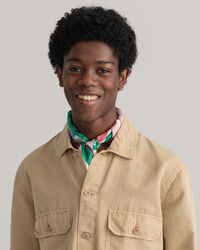 Valmiiksi ommeltuna v&auml;rj&auml;tty p&auml;&auml;llyspaita