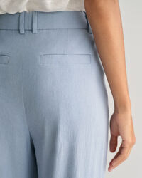 Relaxed fit ‑mitoitetut huolitellut joustopellavahousut