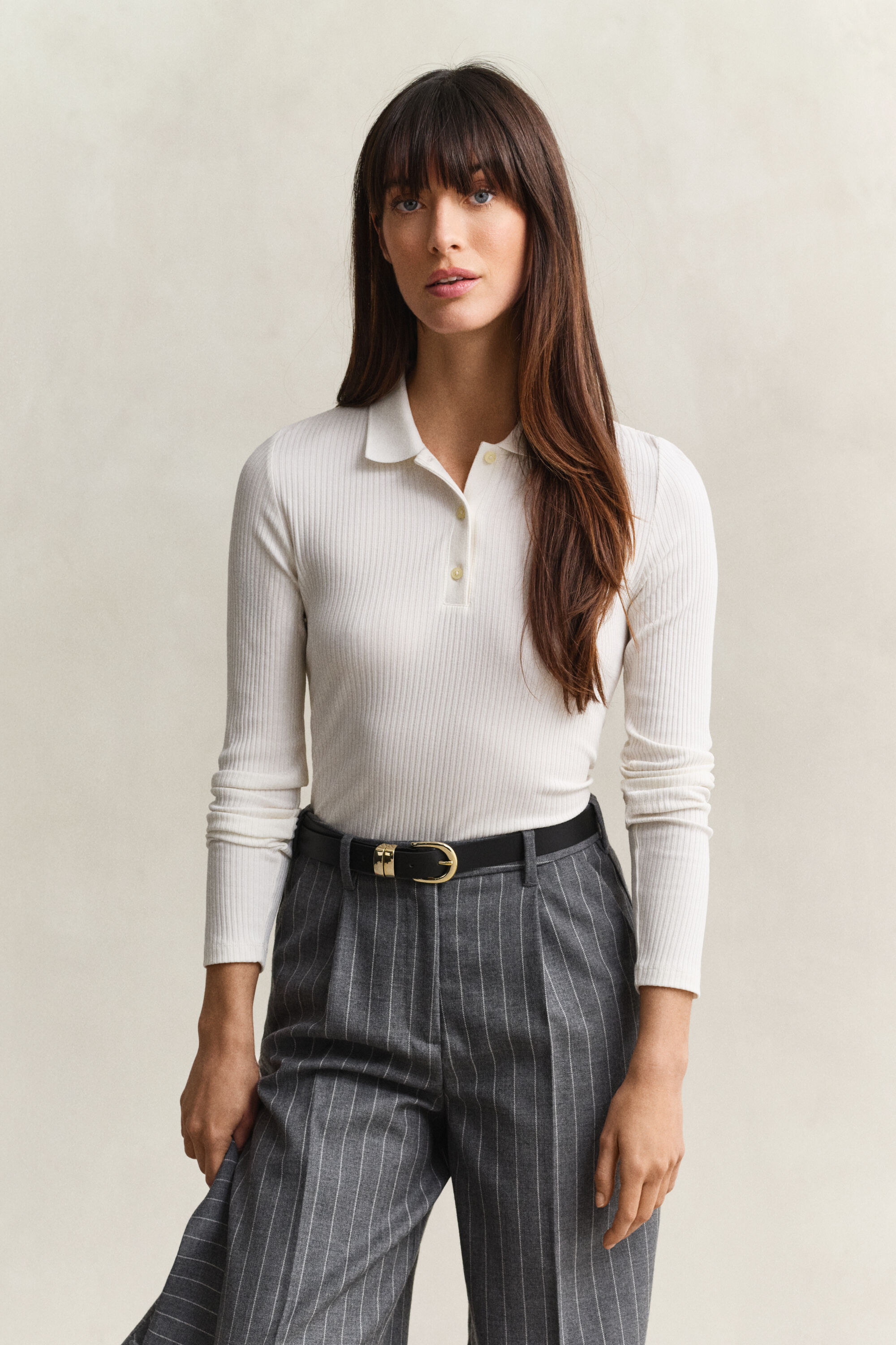 Slim fit -mitoitettu joustinneulottu pikeepaita