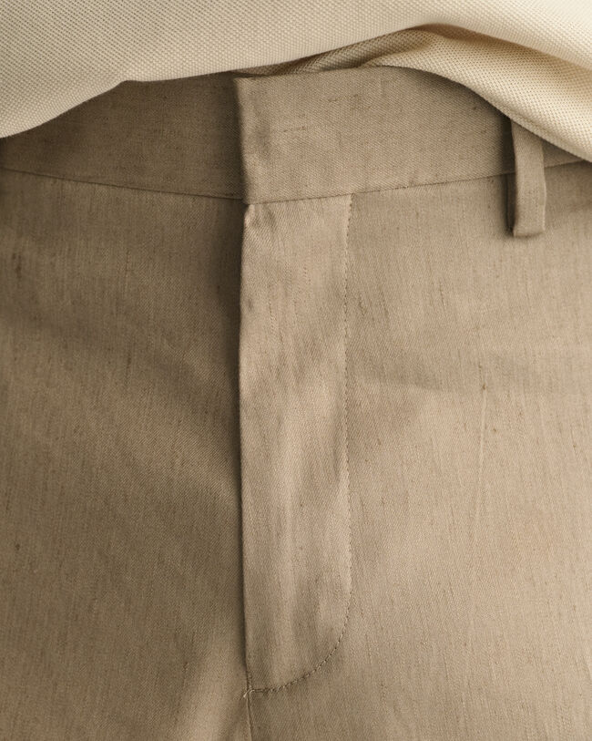 Slim&nbsp;fit ‑mitoitetut puuvilla-pellavaiset puvunhousut