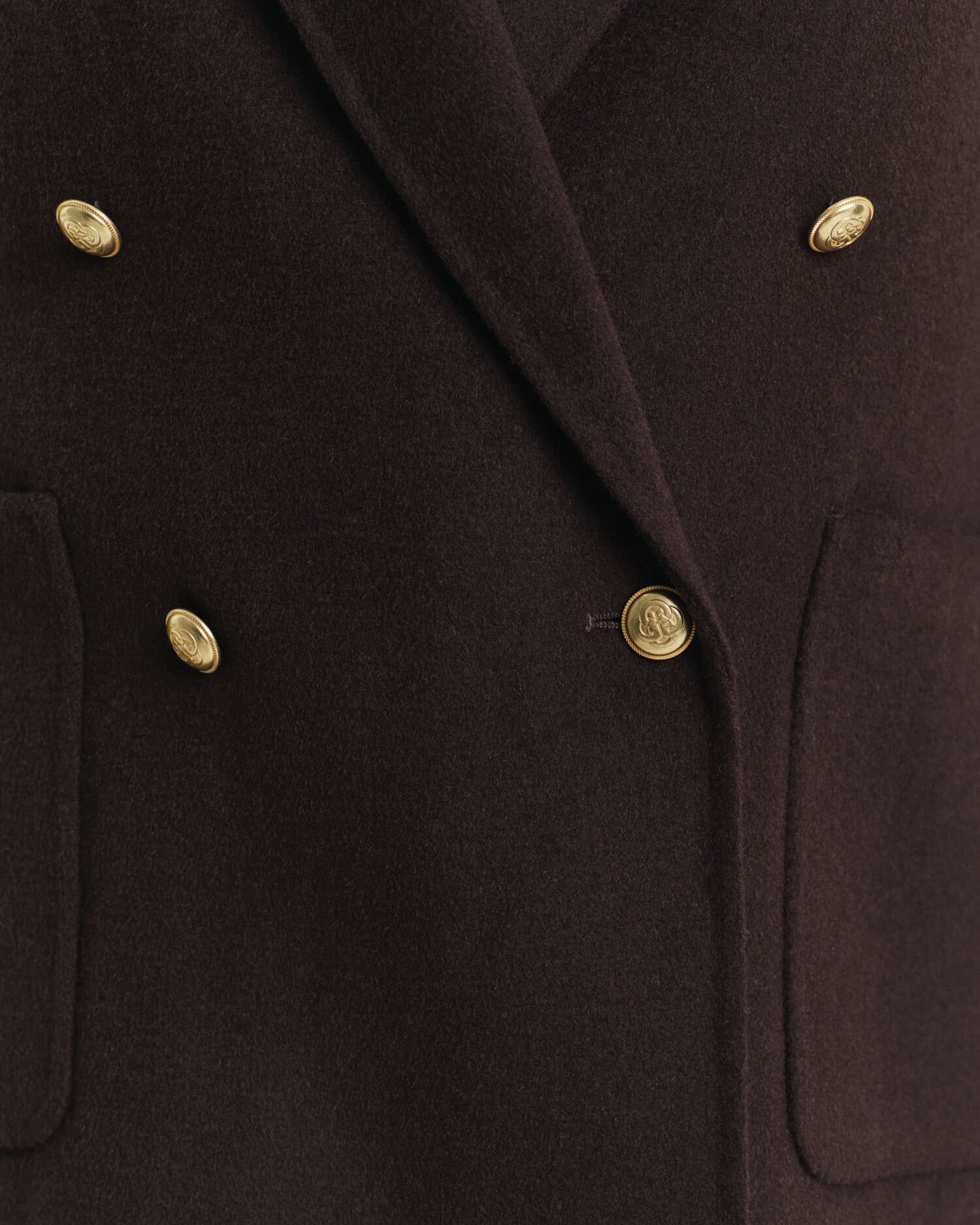 Käsin tikattu klubitakki