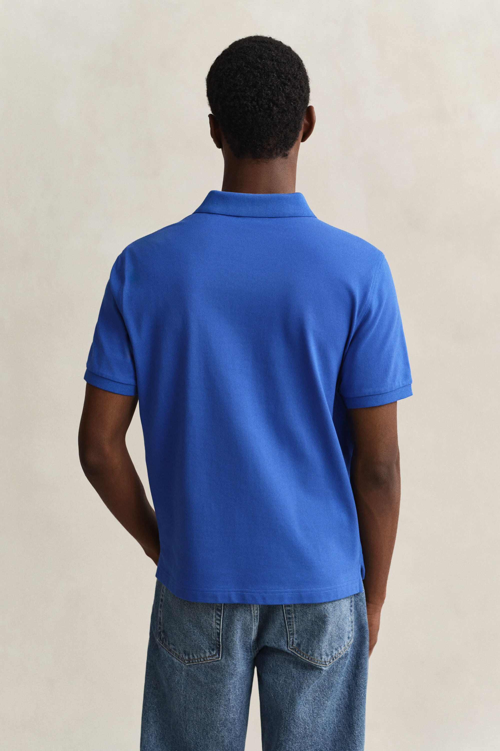 Regular fit ‑mitoitettu pikeepaita