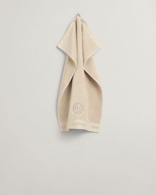 Crest‑pyyhe (30 cm x 50 cm)