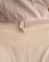 Taskuun pakattava kevyt Windbreaker-takki