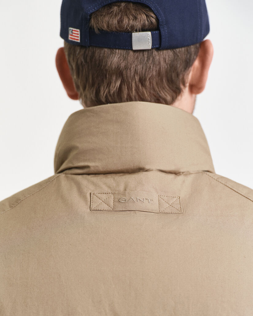 Puuvillainen untuvaliivi